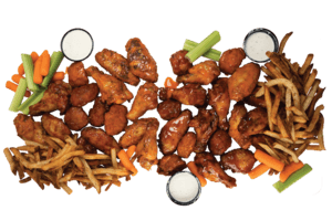 Chicken wings, fries, veggie sticks with ranch dipping sauces