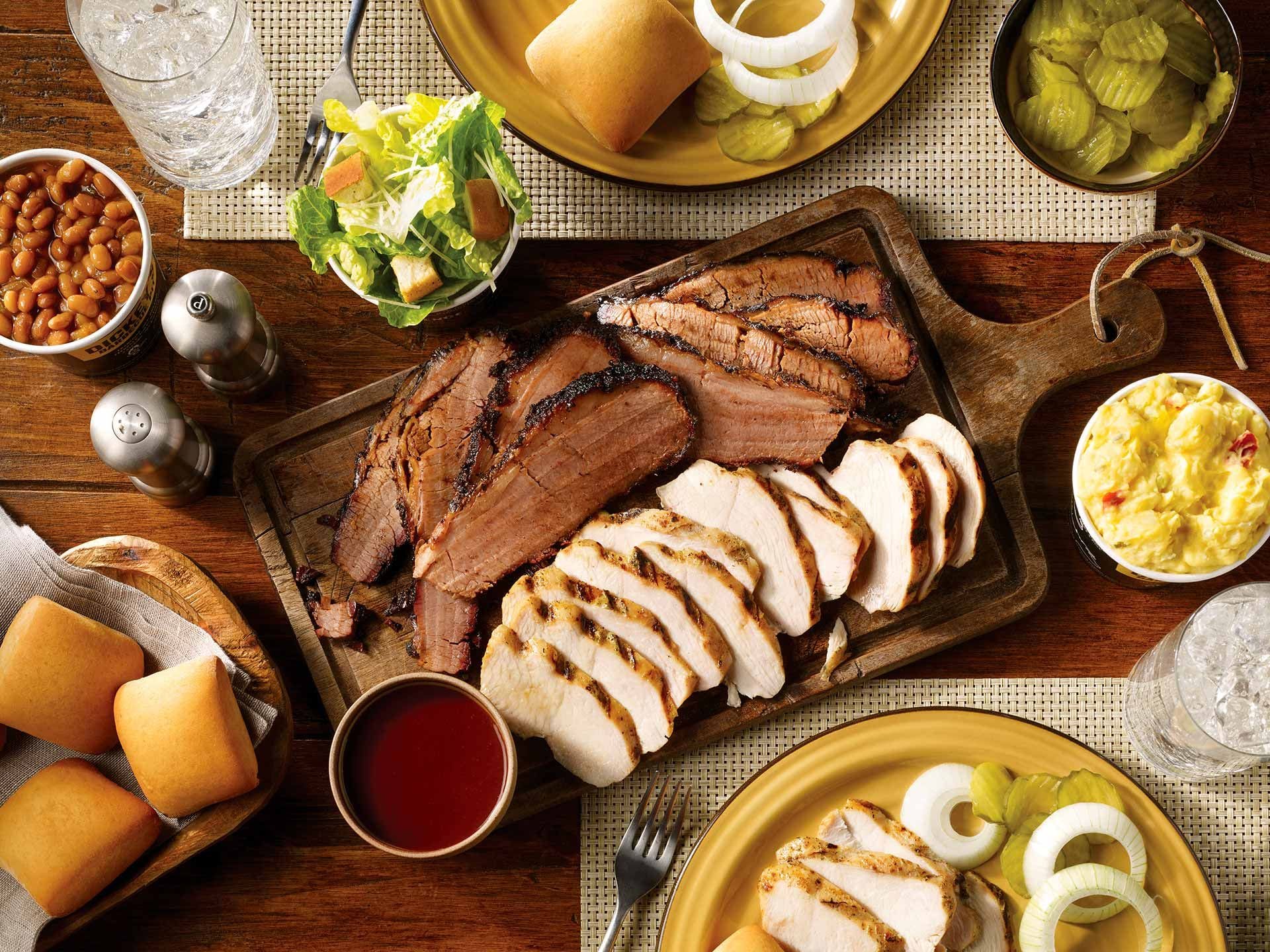 Image depicting delicious barbecue food laid down on the table